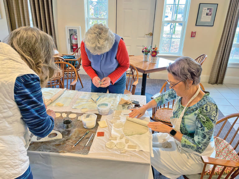 Making ornaments to seasonal music, get into holiday spirit